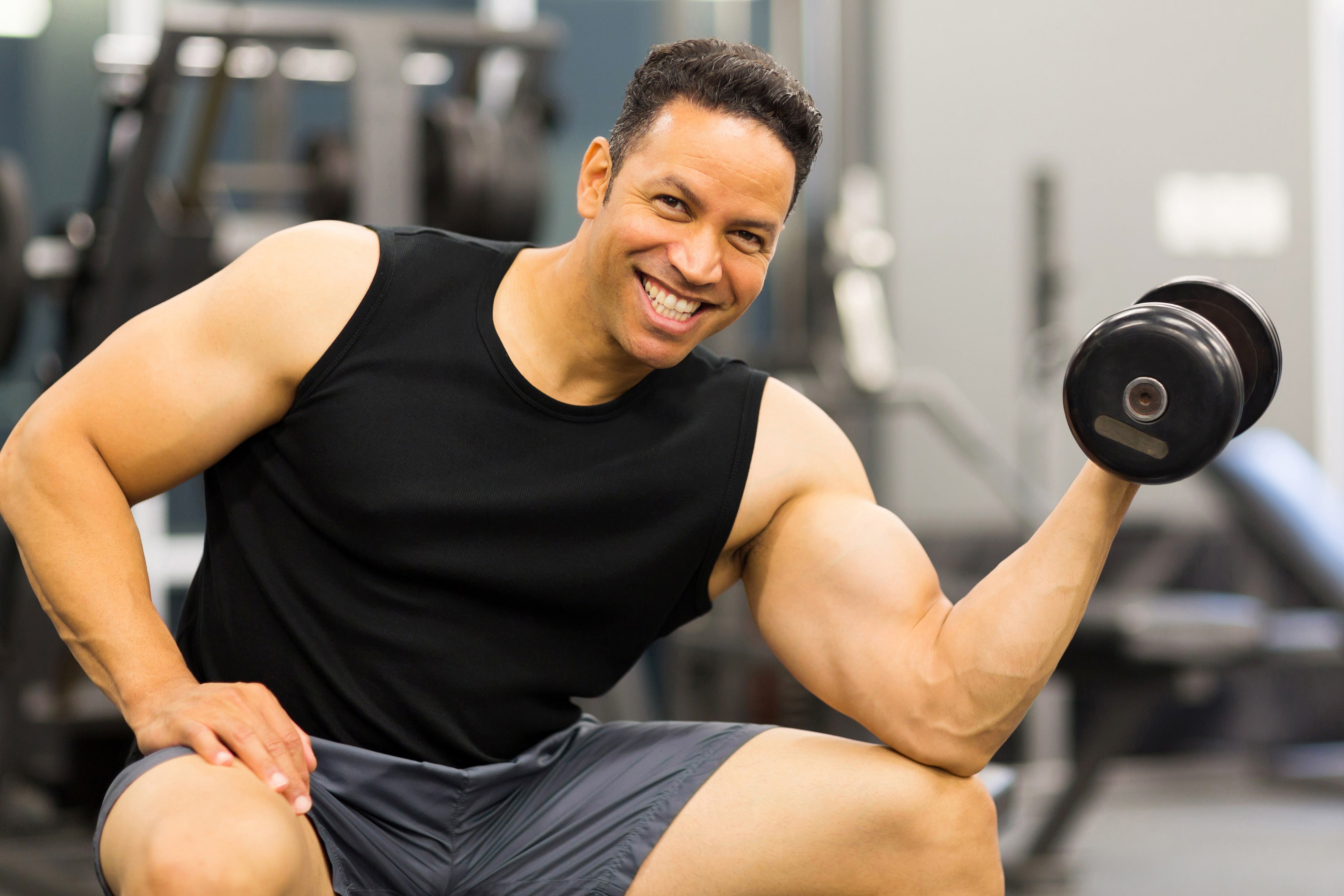 Man Holding Dumbbell